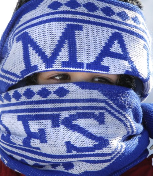 Three year old Ben O'Reilly is dressed for the extreme windchill in the -40C range Wednesday as he and his mother walk his sister along Inkster Blvd. home from school.   (WAYNE GLOWACKI/WINNIPEG FREE PRESS) Winnipeg Free Press  Jan. 23 2013