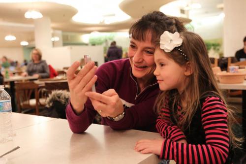 The long standing iconic restaurant on the 6th floor of The Bay downtown The Paddlewheel Restaurant  will be serving up its last meals on Thursday.  Four year old Mia Reynolds and her mom look at photos they took of themselves at the restaurant after lunch. See Randy Turner's story. Jan 23, 2013, Ruth Bonneville  (Ruth Bonneville /  Winnipeg Free Press)