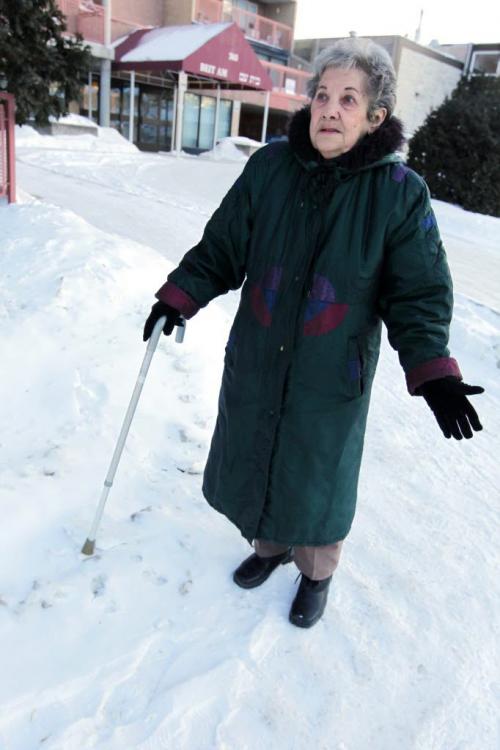 Elsie Karl lives at 765 Akins Street and is really not happy about the sidewalks near her block. They are not shoveled and are very slippery. January 23, 2013  BORIS MINKEVICH / WINNIPEG FREE PRESS