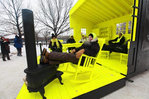 Landscape architect Liz Wreford Taylor (front) along with her fellow teammates who created the HyggeHouse Warming Hut  which is a cozy interior scene of  home painted completely flurorescent yellow to give the viewer a pychological experience of warmth.   See Randy Turner's story. Jan 24, 2013, Ruth Bonneville  (Ruth Bonneville /  Winnipeg Free Press)