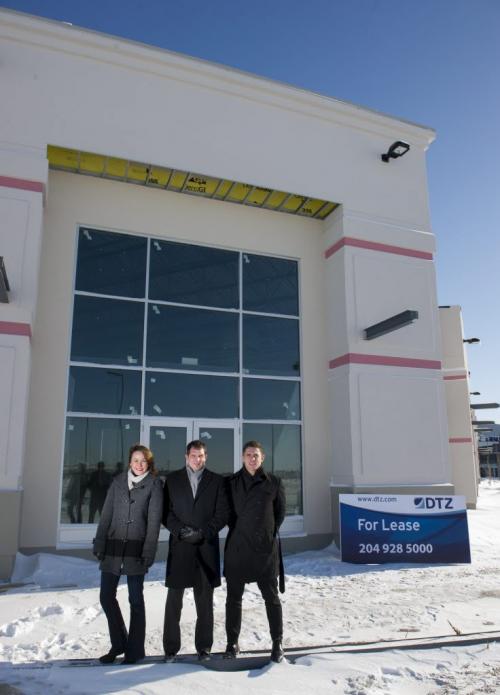 130125 Winnipeg - (L-R) DTZ commercial leasing agent Jane Arnot, and ownership partners Jarret Hannah, and Bobby MacKay outside of the 12,000-square-foot family entertainment centre. The centre is part is part of Phase III of the Sterling Lyon Business Park development.  Business/McNeill - Photo is for MondayÄôs commercial real estate column. DAVID LIPNOWSKI / WINNIPEG FREE PRESS.