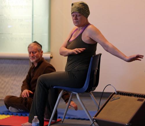 Philip Spevack and Ruth Livingston participate in yoga at Temple Shalom, Saturday, January 26, 2013. (TREVOR HAGAN/WINNIPEG FREE PRESS)