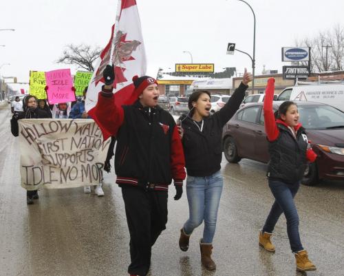 Aboriginal youth from First Nations in Manitoba in support of Idle No More march down Notre Dame Ave. Monday afternoon with a police escort for a rally at the Manitoba legislature at 5 p.m. The youth have been walking for the last few days along Highway 59 to Winnipeg.   see web story   (WAYNE GLOWACKI/WINNIPEG FREE PRESS) Winnipeg Free Press  Jan. 28 2013