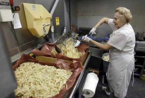 Alina (refused last name request) gets the fries ready in the kitchen at the C. Kelekis Restaurant on Main St. Tuesday. The restaurant will be closing Wednesday.  Randy Turner story   (WAYNE GLOWACKI/WINNIPEG FREE PRESS) Winnipeg Free Press  Jan. 29 2013