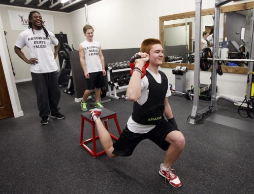 Victory Therapy  ,(left)  Blue Bomber Kito Poblah  helps train local high school football players (right)  Griffin Shillingford  of Kelvin , (centre) and Kellen Pooles  of Vincent Massey Äì ashley prest KEN GIGLIOTTI / JAN. 29 2013 / WINNIPEG FREE PRESS