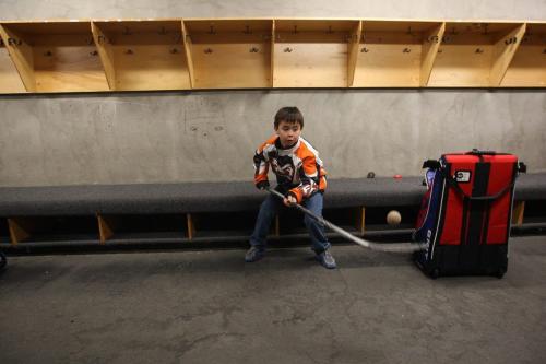 od, Minnesota- 9 year old Daimon Gardner  has some fun in the dressing room before his game in Warrod, Minnesota . He plays on the  Warrod squirt a team-See Randy Turners hockey FYI  story- January 29, 2013   (JOE BRYKSA / WINNIPEG FREE PRESS)