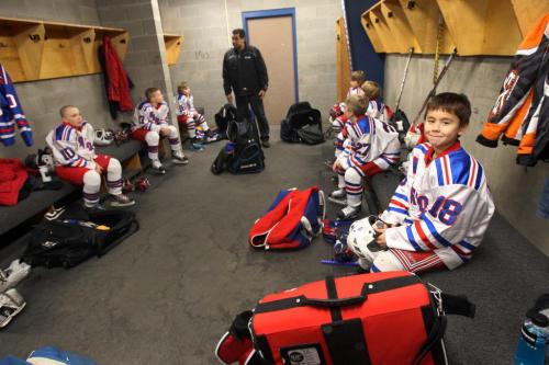Warroad, Minnesota- 9 year old Daimon Gardner, right,  with his teammates before his game in Warrod, Minnesota . He plays on the Warrod squirt a team-See Randy Turners hockey FYI  story- January 29, 2013   (JOE BRYKSA / WINNIPEG FREE PRESS)