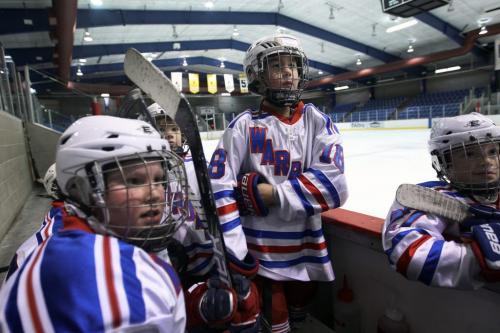 Warroad, Minnesota- 9 year old Daimon Gardner, centre, from the Warrod squirt a team waits for second period to start with teammates  His team was taking on the team from Hallock, Minnesota-See Randy Turners hockey FYI  story- January 29, 2013   (JOE BRYKSA / WINNIPEG FREE PRESS)
