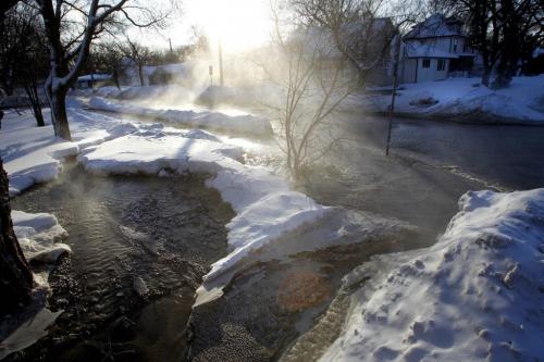 City crews were out at a water main break on Lodge Ave. at Whytewold Rd. Thursday morning that flooded Lodge Ave. between Vernon Rd. and Olive St. and nearby streets. (WAYNE GLOWACKI/WINNIPEG FREE PRESS) Winnipeg Free Press  Jan.31  2013