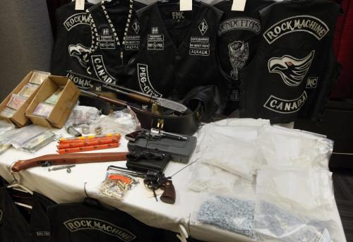 The RCMP announce a major take down called Operation Dilemma  involving 140 RCMP , targeting the  Rock Machine  Motorcycle Gang , 11 people were charged and drugs , guns and money seized  KEN GIGLIOTTI / JAN. 31 2013 / WINNIPEG FREE PRESS