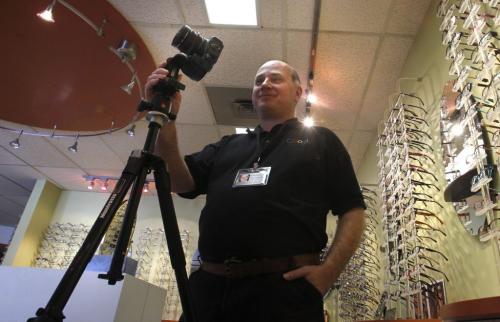Hart Macklin with his photography equipment in the Armstrong + Small, Eye Care Clinic, he shoots interior tours for Google. Macklin is taking pictures of businesses all over town for Google Business. It's all part of Google expanding its Streetview concept and people googling businesses like never before. Geoff Kirbyson story (WAYNE GLOWACKI/WINNIPEG FREE PRESS) Winnipeg Free Press  Jan.31  2013