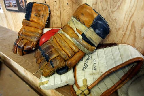 vintage 1956  hockey equipment donated  by Bill Leslie  to the arena  - Jp Bend Memorial Arena in Poplar Point , organizers are  preparing 100 Years of Hockey Celebration and fund raiser Feb 8 . - Bill Leslie  was a player on the 1956-57 Provincial Championship team , Perry Dickenson ' dad played on the same team  are helping to organized  fundraiser   event to support the arena & local  hockey history displays Äì ashley prest story  KEN GIGLIOTTI / JAN. 31 2013 / WINNIPEG FREE PRESS