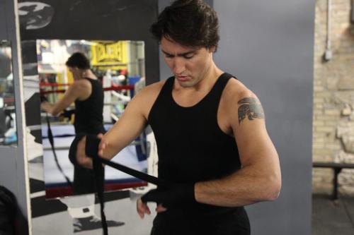 Federal Liberal leadership candidate Justin Trudeau prepares to work out Friday night doing a boxing work out session at the Pan Am Boxing Club with owner Harry Black  He will take place in a leadership candidate debate at 1 p.m. at the Metropolitan Theatre in Winnipeg Saturday afternoon.- February 01, 2013   (JOE BRYKSA / WINNIPEG FREE PRESS)
