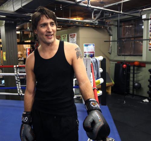 Federal Liberal leadership candidate Justin Trudeau takes a break during work out Friday night doing a boxing work out session at the Pan Am Boxing Club with owner Harry Black  He will take place in a leadership candidate debate at 1 p.m. at the Metropolitan Theatre in Winnipeg Saturday afternoon.- February 01, 2013   (JOE BRYKSA / WINNIPEG FREE PRESS)