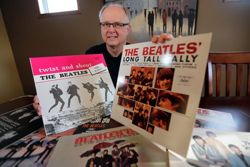 John Einarson posing with his Beatles albums that were only released in Canada, Friday, February 1, 2013. (TREVOR HAGAN/WINNIPEG FREE PRESS)