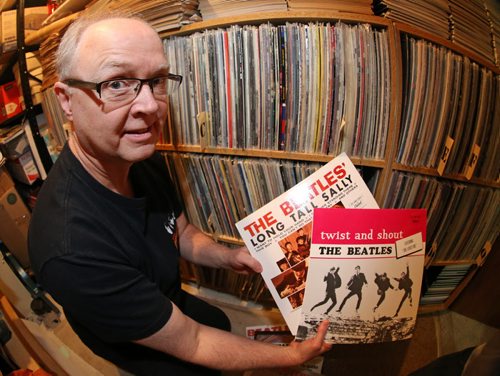 John Einarson posing with his Beatles albums that were only released in Canada, Friday, February 1, 2013. (TREVOR HAGAN/WINNIPEG FREE PRESS)