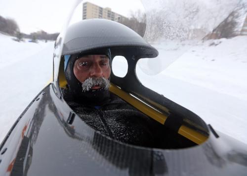Kevin Champagne in the cockpit of his Velomobile on the Red River, Saturday, February 2, 2013. (TREVOR HAGAN/WNNIPEG FREE PRESS)