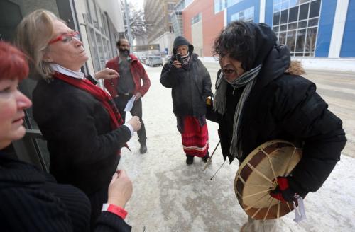 An Idle No More protestor interrupts the Liberal leadership debate at the Metropolitan Theatre, Saturday, February 2, 2013. (TREVOR HAGAN/WNNIPEG FREE PRESS)