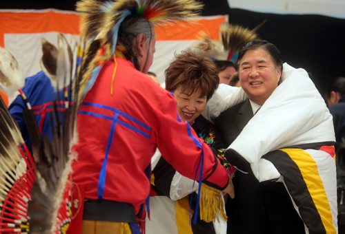Brandon Sun Their Honours Anita and Philip Lee were presented with a gift of a Star Blanket during his visit to the First Nations Pavilion during the Lieutenant Governor's Winter Festival on Saturday afternoon. (Bruce Bumstead/Brandon Sun)