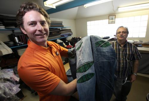 Lawrence Warwaruk, Owner, Luxalune Gastropub poses with his jeans and tailor "Giovanni" Friday afternoon, he has them patched and patched......see my stuff story. February 1,2013 (Phil Hossack / Winnipeg Free Press)