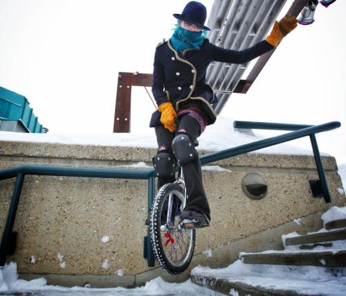 Evie Henry, 20, practices her unicycle skills at The Forks Tuesday afternoon despite the cold weather. She bought the unicycle around six months ago after getting tired of having her bicycle always being stolen.   130205 February 5, 2013 Mike Deal / Winnipeg Free Press