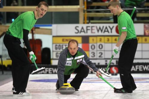 Sean Grassie throws as sweepers Stu Sheills (left) and Kody Janzen take the rock  Wednesday afternoon at the Safeway Championship in Neepawa, They tok on Blair Goethals of Deloraine. See Wiecek's story. February 6, 2013 - (Phil Hossack / Winnipeg Free Press)