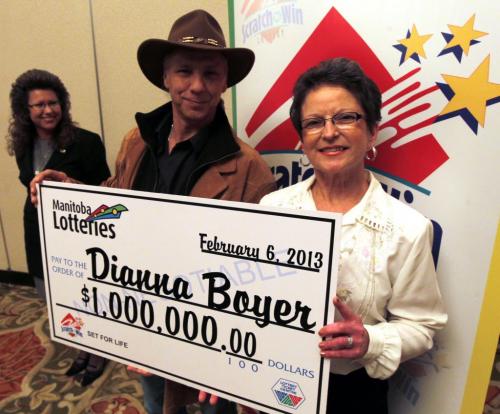 Dianna Boyer won the Set For Life lotto. Her husband Clement with her at the announcement. Feburary 6, 2013  BORIS MINKEVICH / WINNIPEG FREE PRESS