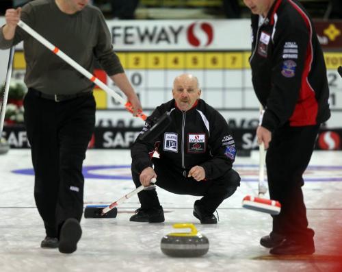 Manitou's Rene Kolly keeps his cool against Charlsewood's Jeff Soughton at the Neepawa Safeway Championships Wednesday afternoon. See Paul Wiecek's storty. February 6, 2013 - (Phil Hossack  Winnipeg Free Press)