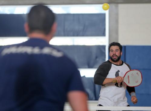 Curtis Relke, left, and Adamo Rondinella plays Pickle Ball, a life size version of table tennis that requires at least 2 people, at the Wellness Institute located at Seven Oaks Hospital, February 6, 2013. (TREVOR HAGAN/WINNIPEG FREE PRESS)