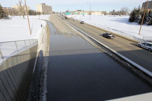 A water main break from the St. James Hotel flooded the route 90 underpass southbound. Feb 7, 2013  BORIS MINKEVICH / WINNIPEG FREE PRESS
