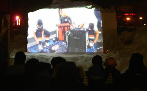 Spectators watching one of 5 short hockey films being projected outside on a snow screen at The Forks, Friday, February 8, 2013. (TREVOR HAGAN/WINNIPEG FREE PRESS)