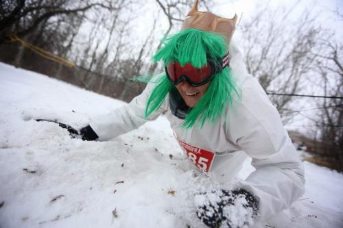 A member of team, Badder Than Rams climbs under the Spider Web during the Swamp Donkey Winter Race at the University of Manitoba, Sunday, February 10, 2013. (TREVOR HAGAN/WINNIPEG FREE PRESS)
