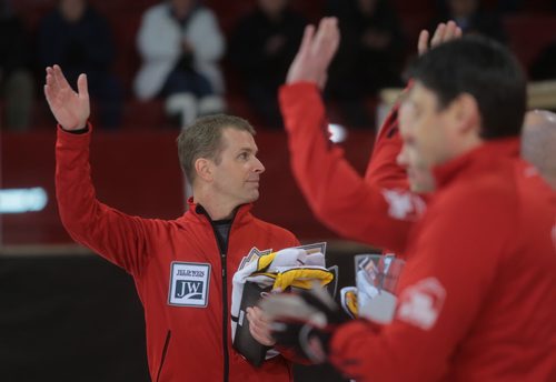 Brandon Sun Skip Jeff Stoughton waves to the crowd during the awards ceremony at the Safeway Championships in Neepawa, Man., on Sunday. (Bruce Bumstead/Brandon Sun)