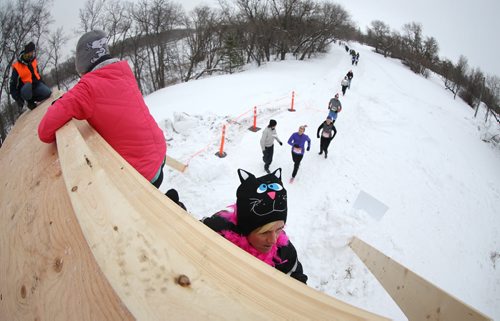 Participants make their way over the Tower of Power obstacle, during the Ice Donkey run at the University of Manitoba, Sunday, February 10, 2013. (TREVOR HAGAN/WINNIPEG FREE PRESS)