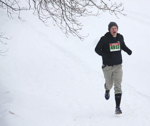 A participant runs through the snow during the Ice Donkey run at the University of Manitoba, Sunday, February 10, 2013. (TREVOR HAGAN/WINNIPEG FREE PRESS)