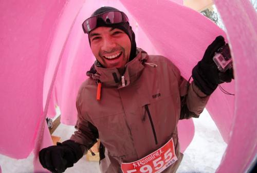 Allan Asplin makes his way through the "Lick the Pole" obstacle during the Ice Donkey run at the University of Manitoba, Sunday, February 10, 2013. (TREVOR HAGAN/WINNIPEG FREE PRESS)