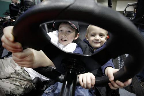 February 10, 2013 - 130210  -  Photographed at the Mid-Canada PowerSport Show at the Convention Centre (L to R) Dylan Fleming (9) and his cousin Heath White (4) try out a new ATV Sunday February 10, 2013. John Woods / Winnipeg Free Press