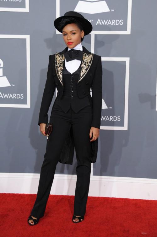 Janelle Monae arrives at the 55th annual Grammy Awards on Sunday, Feb. 10, 2013, in Los Angeles.  (Photo by Jordan Strauss/Invision/AP)