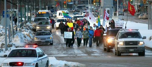 Youth from the Kinonjeoshtegon First Nation march down Memorial st towards the Legislature Monday afternoon. They started their protest walk against Bill C-45 on Feb 8th.  See Carol Sanders story. February 11, 2013 - (Phil Hossack / Winnipeg Free Press)