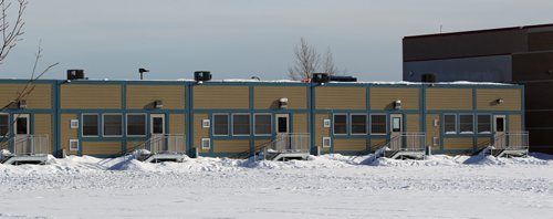 Portable classrooms ring the Leila North School Tuesday afternoon. See story. February 12, 2013 - (Phil Hossack / Winnipeg Free Press)