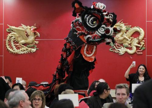 February 12, 2013 - 130212  -  People enjoy the Lion Dance performed by the Ching Wu Athletic Association at the Chinese New Year Banquet at Kum Koon Garden Restaurant Tuesday February 12, 2013. John Woods / Winnipeg Free Press