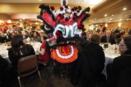 February 12, 2013 - 130212  -  People enjoy the Lion Dance performed by the Ching Wu Athletic Association at the Chinese New Year Banquet at Kum Koon Garden Restaurant Tuesday February 12, 2013. John Woods / Winnipeg Free Press