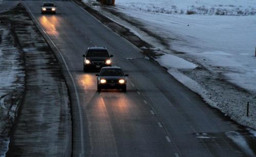 Vehicles travel on The Trans Canada Highway East of the City of Winnipeg Wednesday evening.  130213 February 13, 2013 Mike Deal / Winnipeg Free Press
