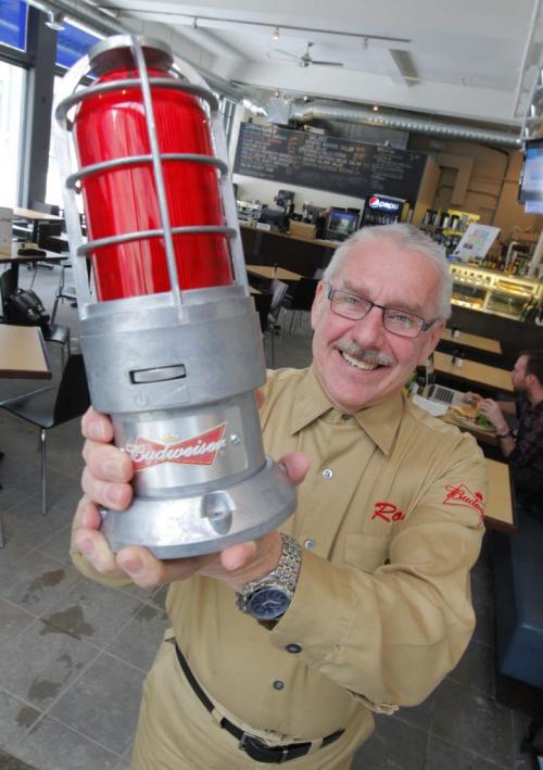 Ron Kovacs poses with a Budweiser Red Light at the FP Cafe. Feb 15, 2013  BORIS MINKEVICH / WINNIPEG FREE PRESS