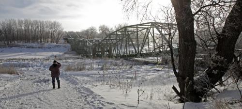 The St. Jean Baptiste bridge was demolished around 9 a.m. Saturday morning in front of a gathering of townspeople and local residents. 130216 - Saturday, February 16, 2013 -  (MIKE DEAL / WINNIPEG FREE PRESS)