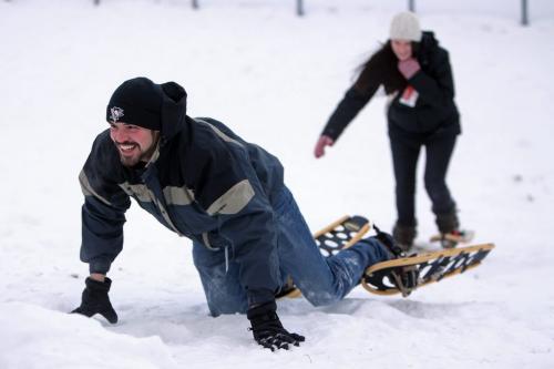 Tim Cypher laughs after wiping out while racing up a hill on snowshoes at the Festival du Voyageur, Saturday, February 16, 2013. (TREVOR HAGAN/WINNIPEG FREE PRESS)