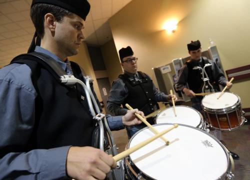 Tyler Osmond, Dave Chorney and Aaron Rosin of The St. Andrews Society of Winnipeg Pipe Band warming up before performing at the 20th annual Winnipeg Scottish Festival at the Convention Centre, Saturday, February 16, 2013. (TREVOR HAGAN/WINNIPEG FREE PRESS)