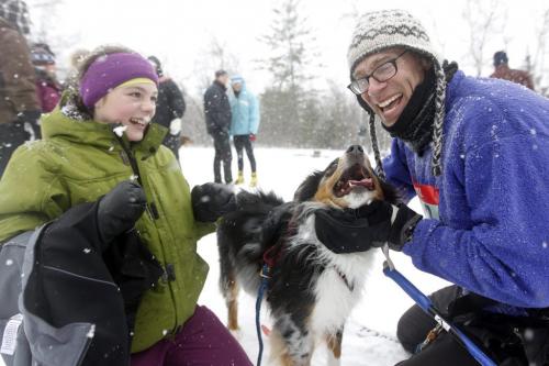 Tannis Hydesmith, 12, congratulates her dad, Brian, and their Australian Shehperd, Ike, at the 6th annual Snow Motion Classic, in Birds Hill Park, Sunday, February 17, 2013. (TREVOR HAGAN/WINNIPEG FREE PRESS)