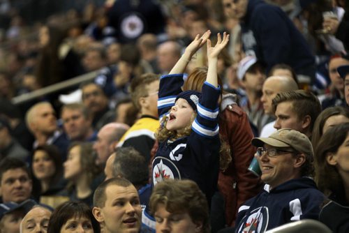 A young Jets Fans cheers as the Boston Bruins play Sunday Feb 17, 2013 against the Winnipeg JetsFor Files- please credit when used- February 19, 2013   (JOE BRYKSA / WINNIPEG FREE PRESS)