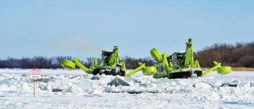 The fleet of Amphibex icebreaking machines have started the annual ice-jam prevention program on the Red River north of Selkirk, MB.  130220 February 20, 2013 Mike Deal / Winnipeg Free Press